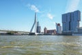 Erasmus bridge and for the building the Rotterdam along the Wilhelminakade has the AIDA cruise ship docked.